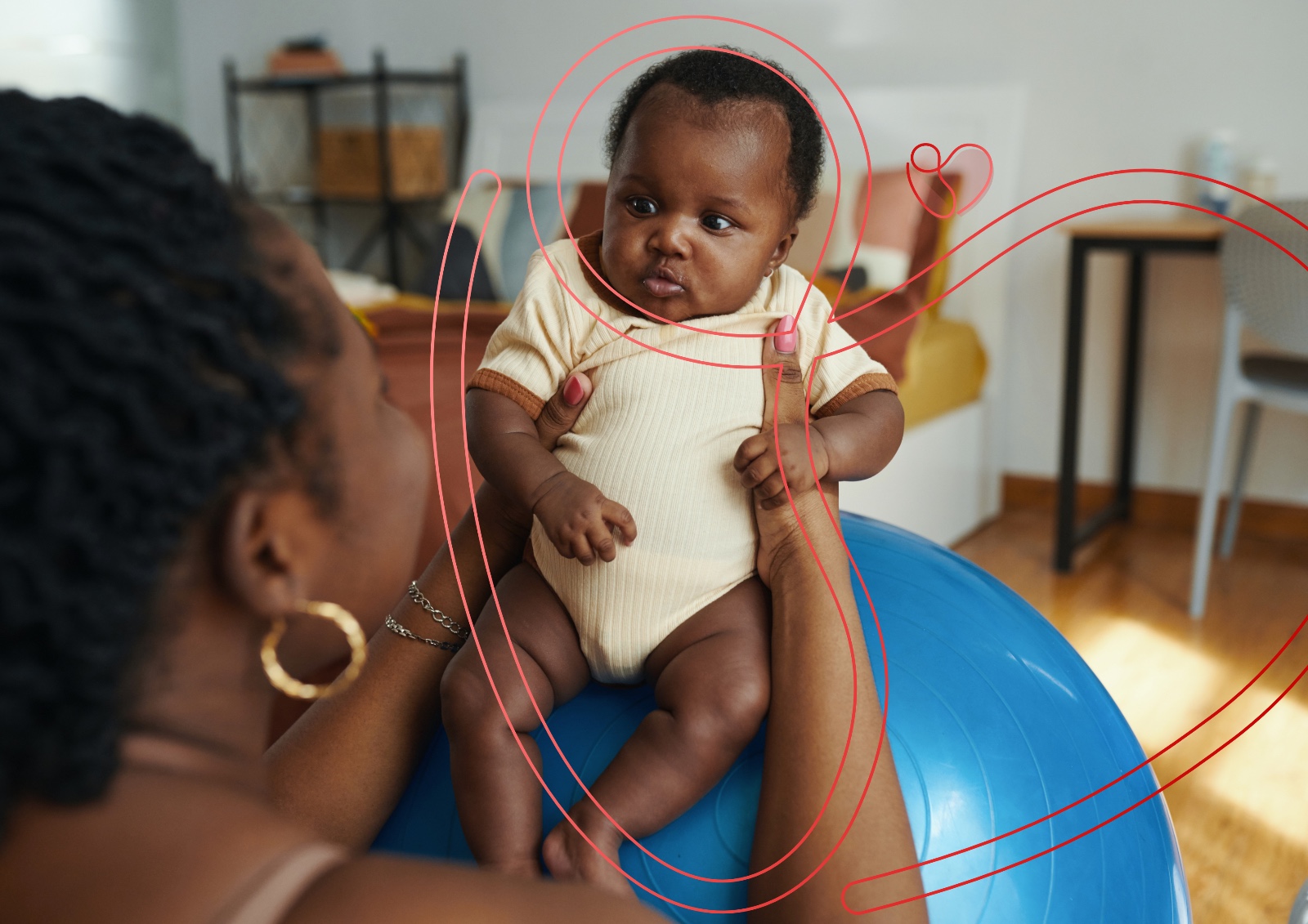 African mother lovingly kissing her baby